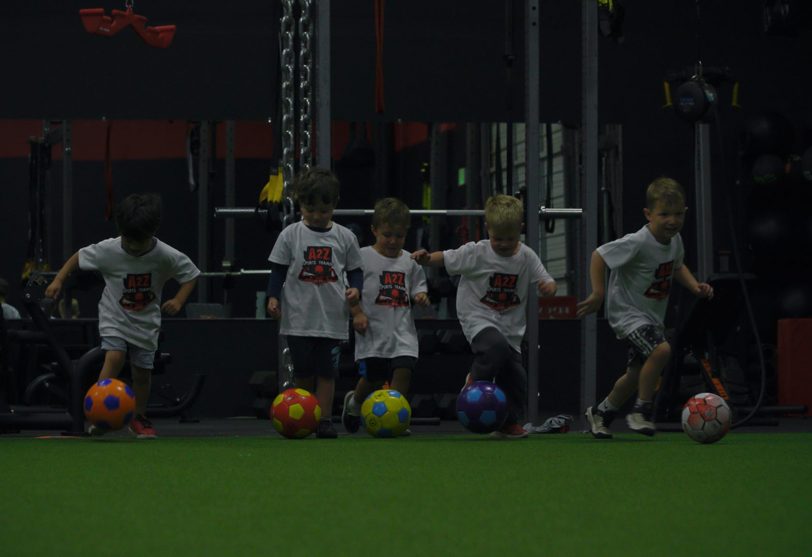 Kids doing a ball drill at the A2Z Sports Training indoor facility in Mesa